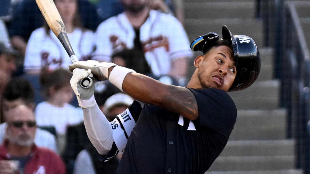 New York Yankees second baseman Jorbit Vivas (90) strikes out in the second inning against the Atlanta Braves during spring training at George M. Steinbrenner Field. 