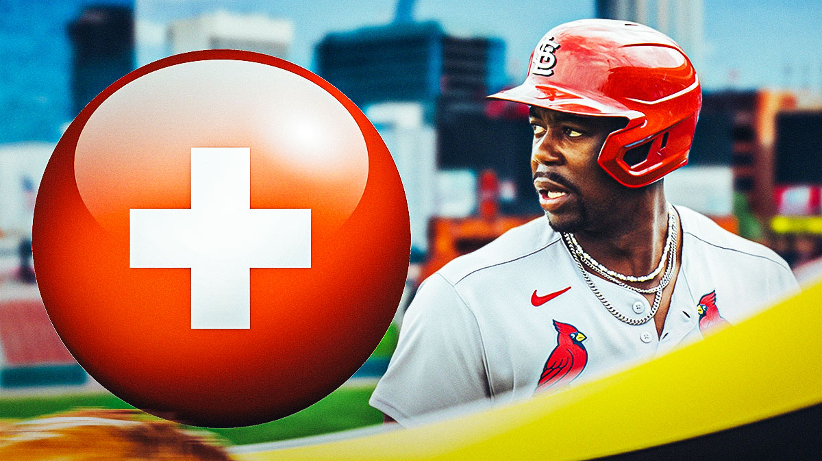 Jordan Walker (Cardinals) looking concerned, medical cross and Busch Stadium in background