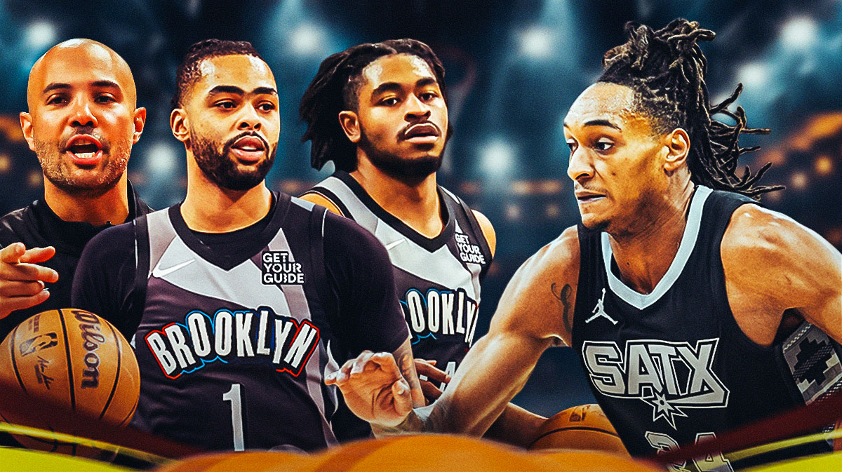 Jordi Fernandez, D'Angelo Russell and Cam Thomas looking at Devin Vassell