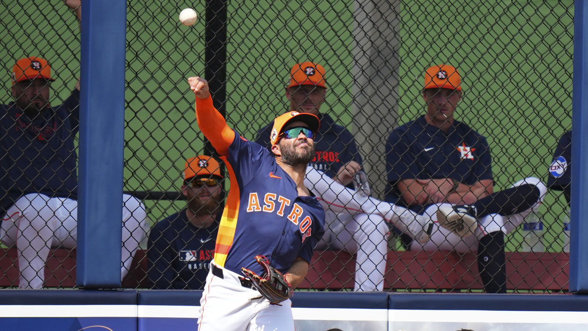 Houston Astros player Jose Altuve (27) fields the ball against the St. Louis Cardinals during the third inning at CACTI Park of the Palm Beaches. 