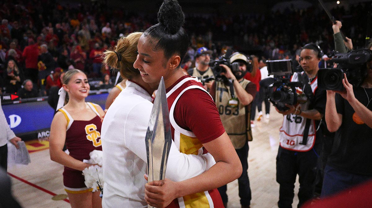 USC Trojans head coach Lindsay Gottlieb (left) hugs guard JuJu Watkins (12) after the Trojans defeated the UCLA Bruins at Galen Center. The Bruins came into the game ranked #1 in the country.