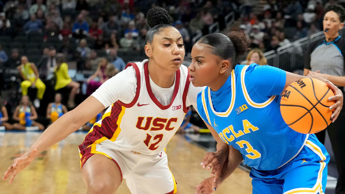 USC Trojans guard JuJu Watkins (12) guards UCLA Bruins guard Londynn Jones (3) during the first half of the 2025 TIAA Big Ten Women's Basketball Tournament final game on Sunday, March 9, 2025, at Gainbridge Fieldhouse in Indianapolis. UCLA defeated USC 72-67.