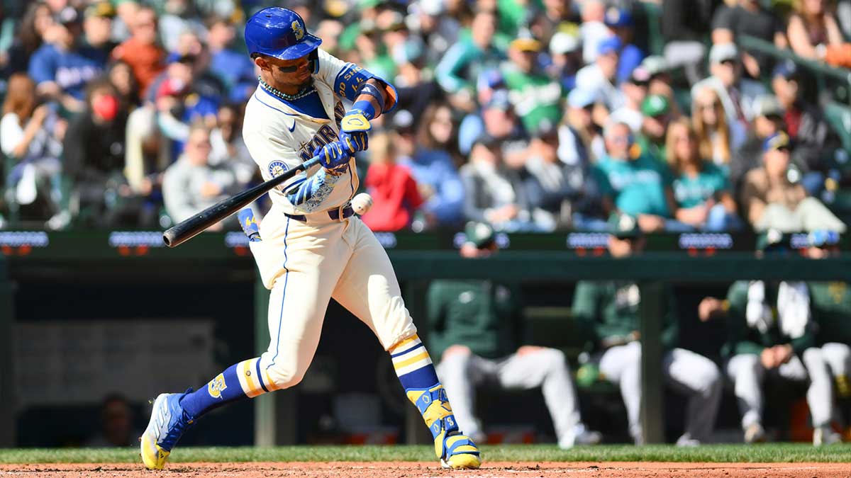 Seattle Mariners center fielder Julio Rodriguez (44) hits an RBI single against the Oakland Athletics during the fifth inning at T-Mobile Park