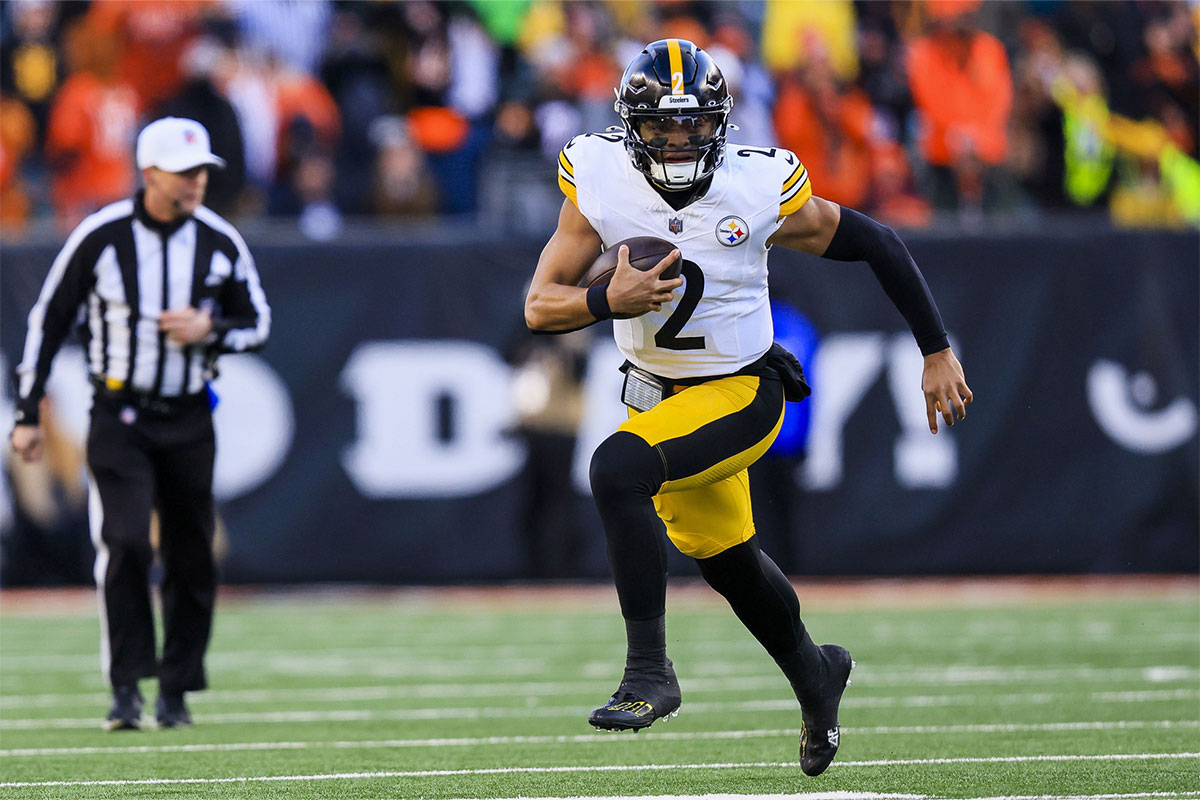 Dec 1, 2024; Cincinnati, Ohio, USA; Pittsburgh Steelers quarterback Justin Fields (2) runs with the ball against the Cincinnati Bengals in the second half at Paycor Stadium.