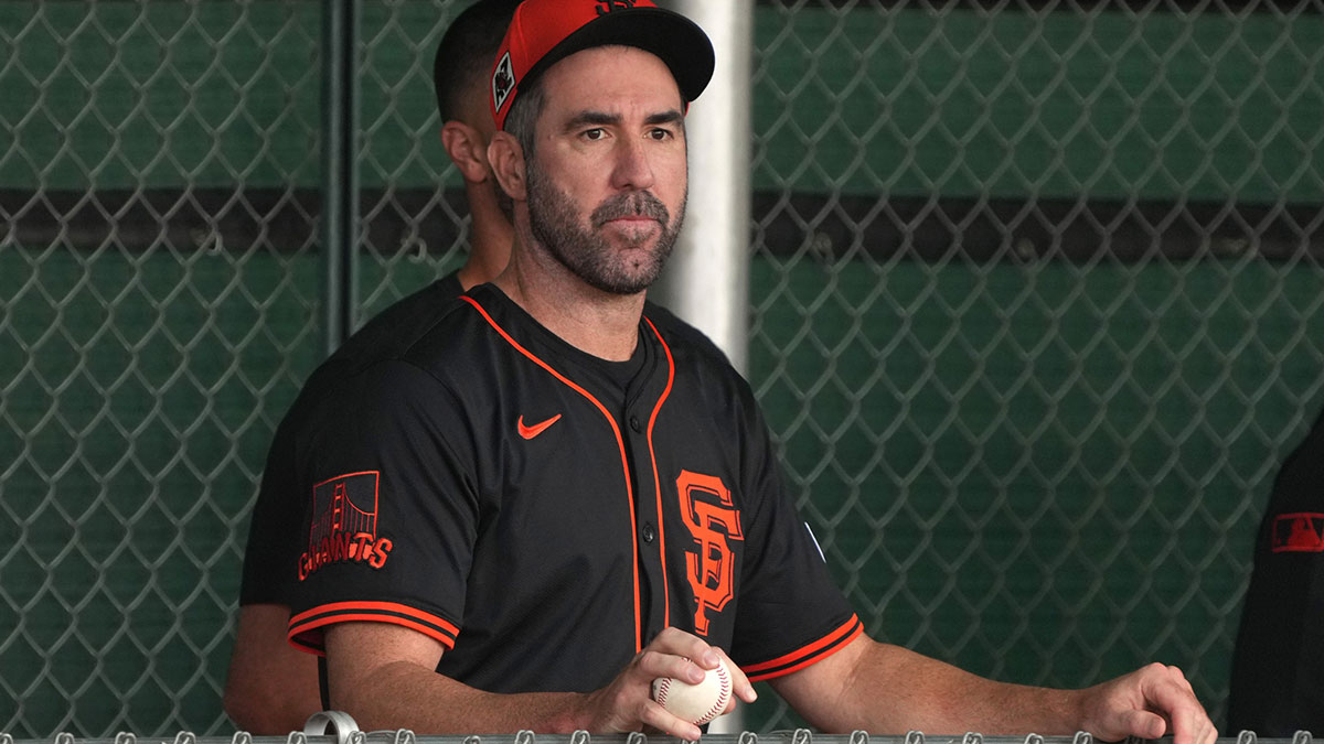 San Francisco Giants pitcher Justin Verlander (35) watches players work out in the bullpen during spring training camp.