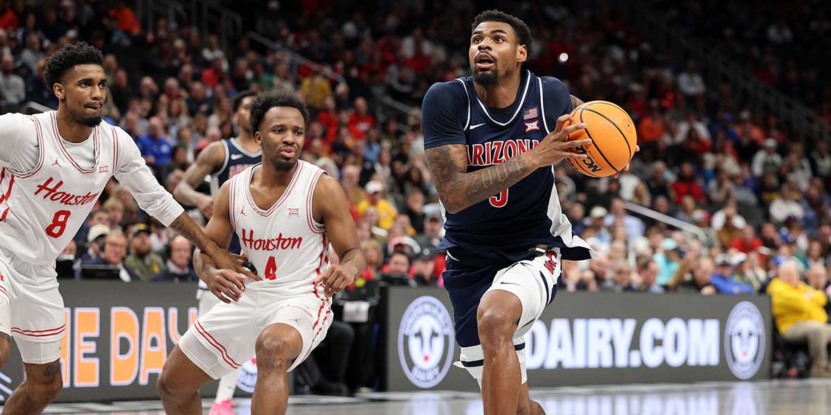 Arizona Wildcats guard KJ Lewis (5) drives to the basket against the Houston Cougars during the second half for the Big 12 Conference Tournament Championship game at T-Mobile Center. Mandatory Credit: William Purnell-Imagn Images