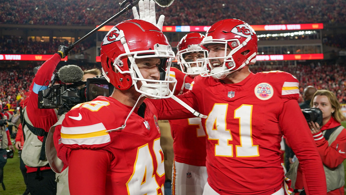 Kansas City Chiefs place kicker Matthew Wright (49) celebrates with long snapper James Winchester (41) after the win over the Los Angeles Chargers at GEHA Field at Arrowhead Stadium.