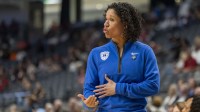 Duke Blue Devils head coach Kara Lawson works with her team during the Sweet 16 NCAA Tournament basketball game against the North Carolina Tar Heels at Legacy Arena.