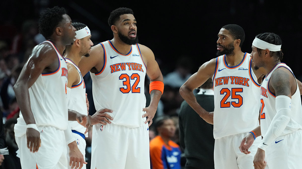 New York Knicks center Karl-Anthony Towns (32) talks to his teammates during the second half against the Portland Trail Blazers at Moda Center.