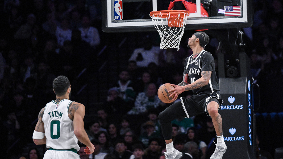 Brooklyn Nets guard Keon Johnson (45) ducks the ball as Boston Celtics forward Jayson Tatum (0) trails the play during the second half at Barclays Center.