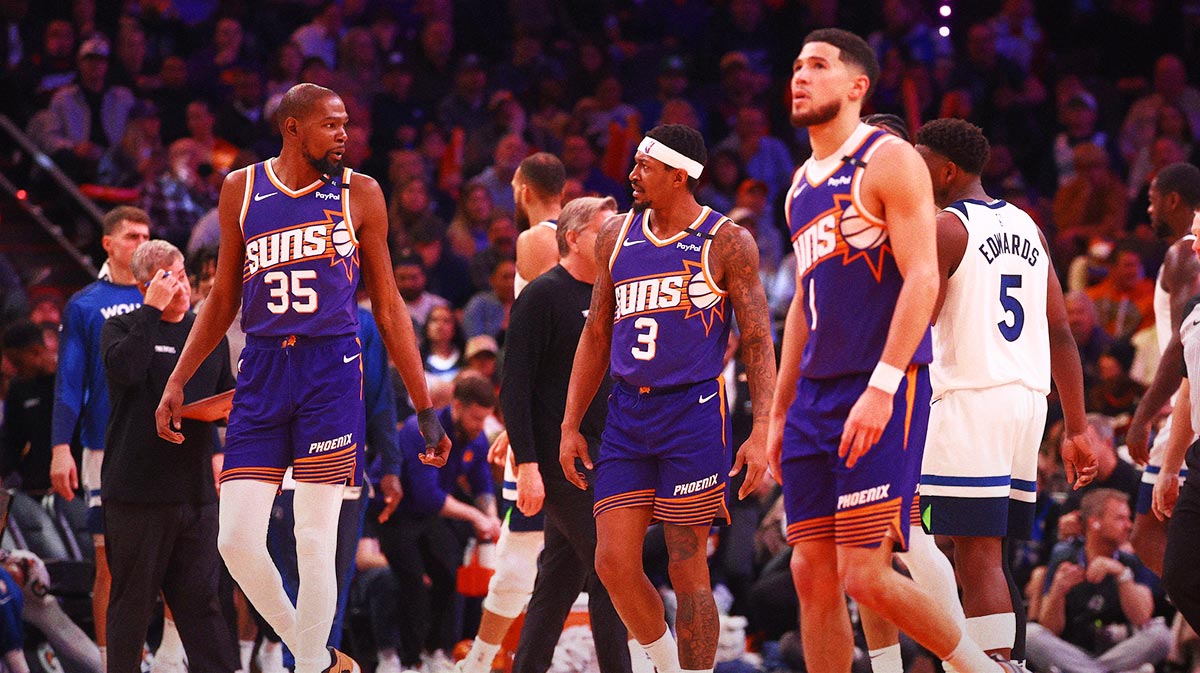 Phoenix Suns forward Kevin Durant (35) with guard Bradley Beal (3) and Devin Booker (1) against the Minnesota Timberwolves at Footprint Center
