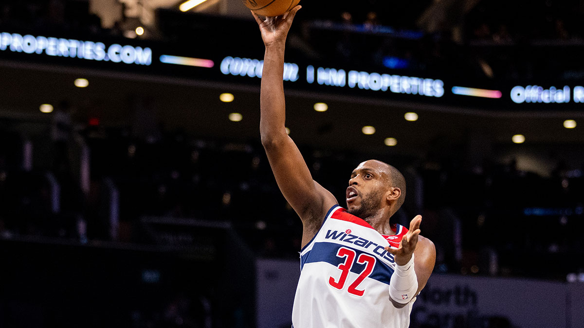 Washington Wizards forward Khris Middleton (32) shoots against the Charlotte Hornets during the third quarter at Spectrum Center. 