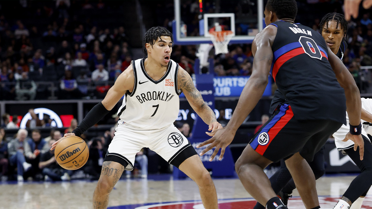 Brooklyn Nets guard Killian Hayes (7) dribbles against Detroit Pistons center Jalen Duren (0) in the first half at Little Caesars Arena.