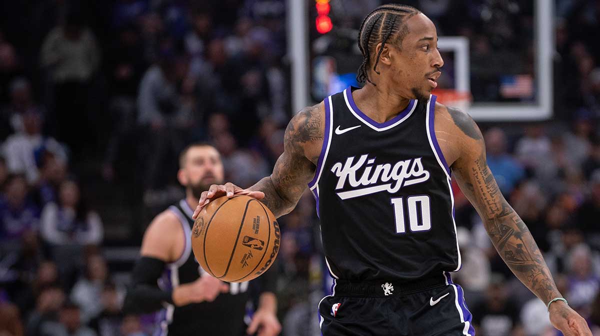 Sacramento Kings forward DeMar DeRozan (10) controls the ball against the San Antonio Spurs during the first quarter at Golden 1 Center.