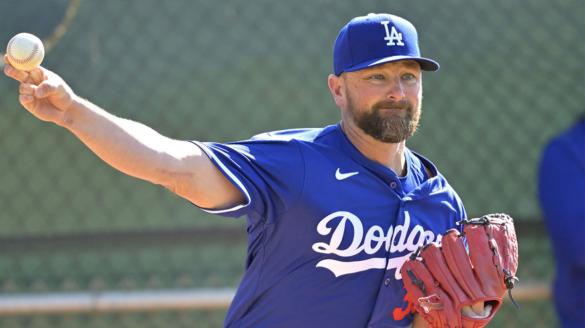 Los Angeles Dodgers relief pitcher Kirby Yates (38) throws in the bullpen during spring training workouts at Camelback Ranch. 