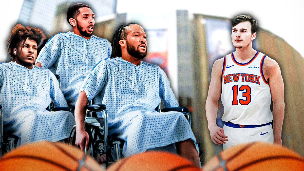 Tyler Kolek shouting or looking excited with Jalen Brunson, Miles McBride, and Cam Payne all sitting in wheelchairs