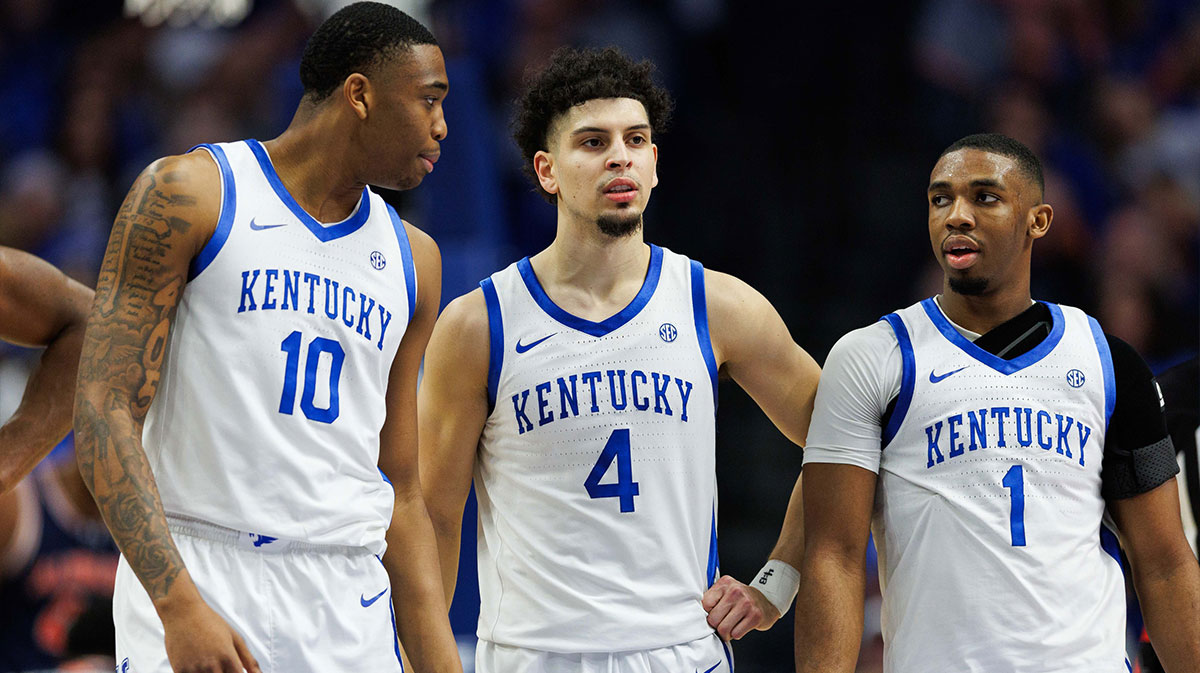 Mar 1, 2025; Lexington, Kentucky, USA; Kentucky Wildcats guard Koby Brea (4) walks down the court with forward Brandon Garrison (10) and guard Lamont Butler (1) during the first half against the Auburn Tigers at Rupp Arena at Central Bank Center.