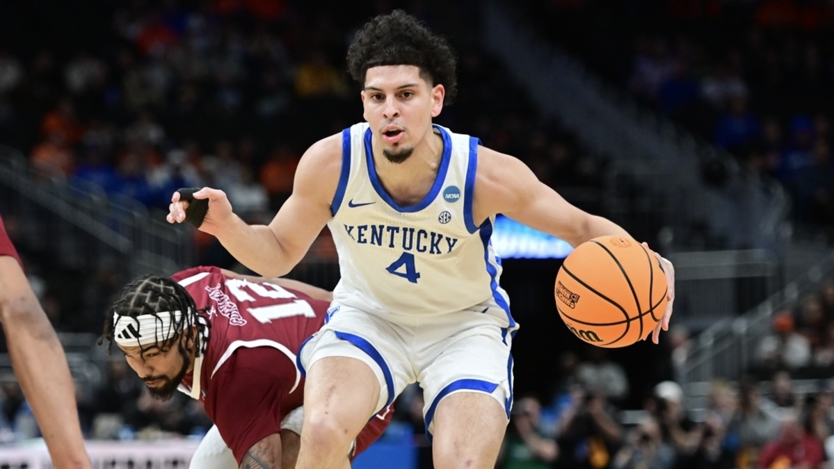 Kentucky Wildcats guard Koby Brea (4) drives to the hoop past Troy Trojans guard Tayton Conerway (12) during the first half at Fiserv Forum.