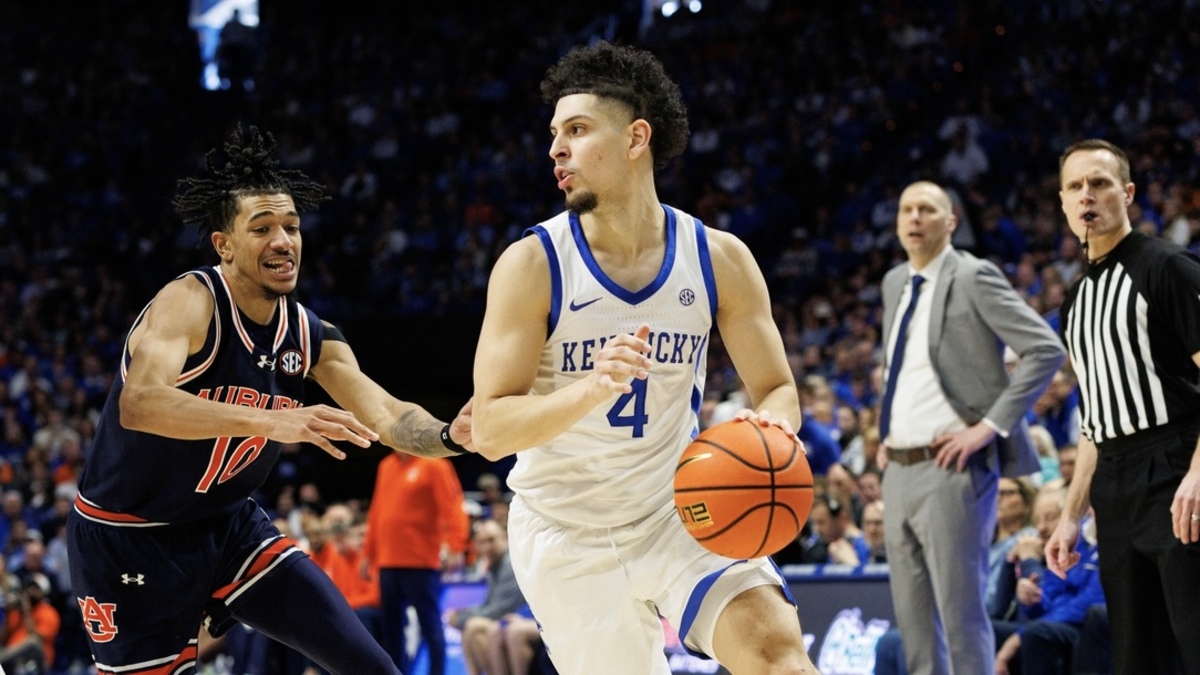 Kentucky Wildcats guard Koby Brea (4) drives to the basket around Auburn Tigers guard Chad Baker-Mazara (10) during the second half at Rupp Arena at Central Bank Center.