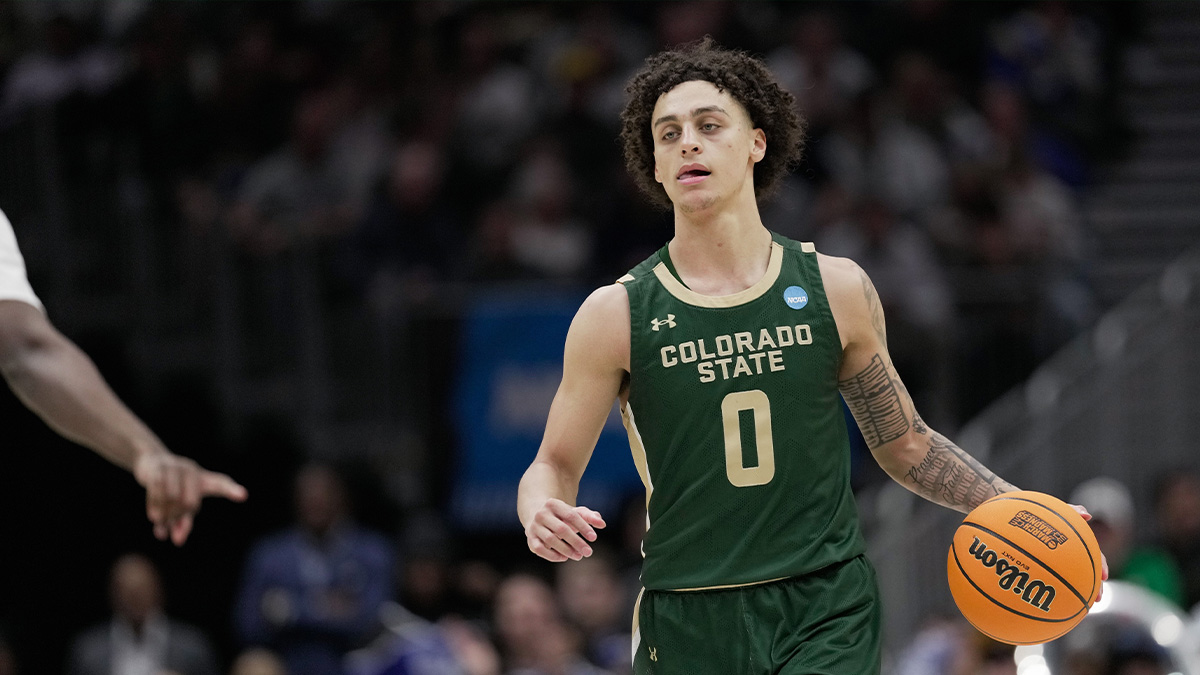 Colorado State Rams guard Kyan Evans (0) drives the ball during the second half against Memphis Tigers at Climate Pledge Arena.