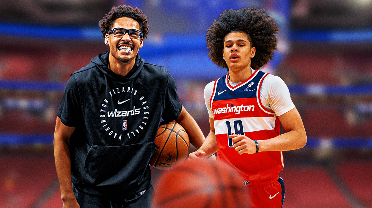 Jordan Poole smiles at Kyshawn George