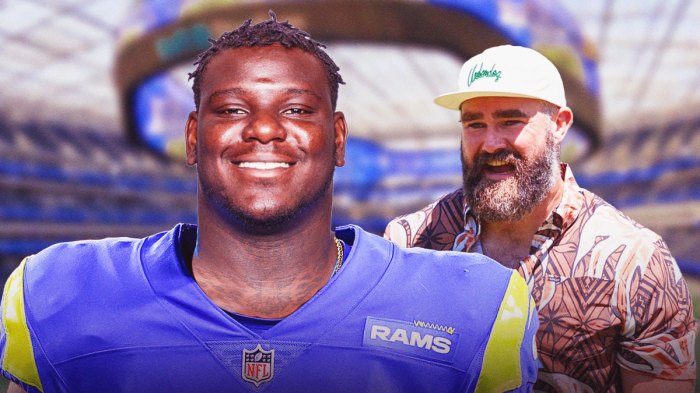 Jason Kelce next to Poona Ford wearing a Rams uniform.