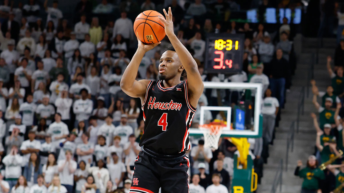 Houston Cougars guard L.J. Cryer (4) scores a three-point basket against the Baylor Bears during the first half at Paul and Alejandra Foster Pavilion.