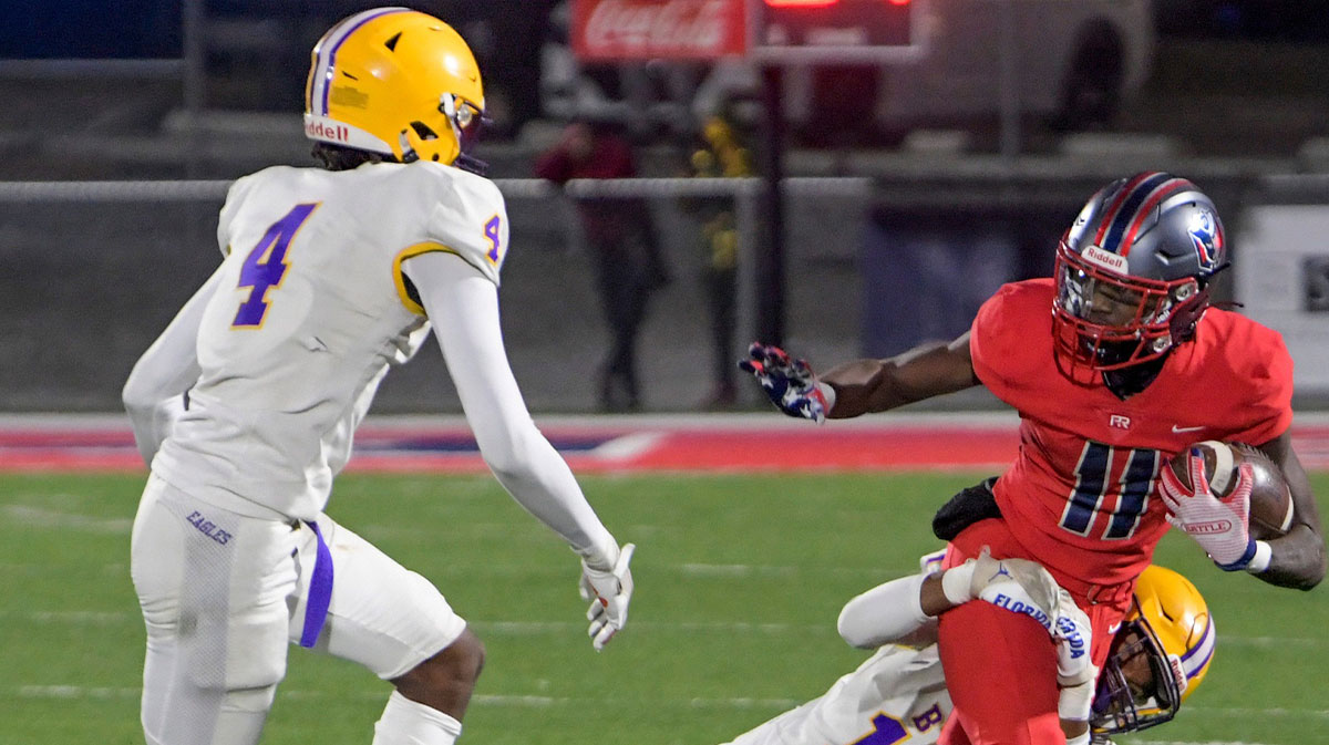 Booker T. Washington's Dylan Purter (17) brings down Pike Road's Kaleb Foster (11) during their game in Pike Road , Ala., on Friday November 3, 2023.