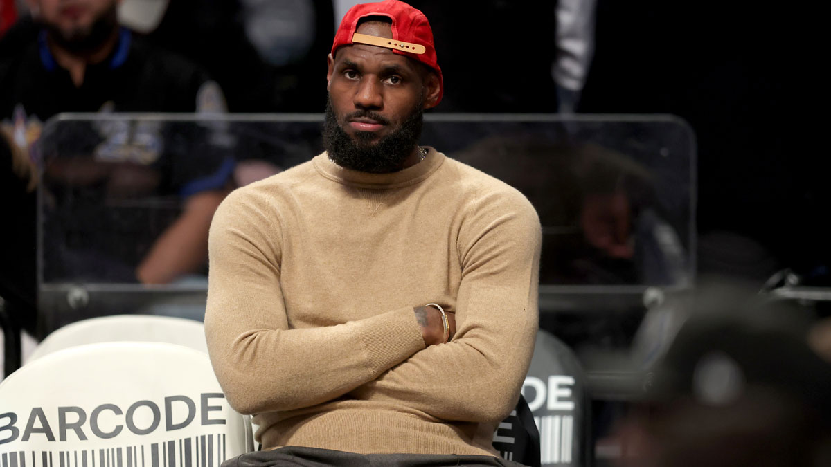 Lakers forward LeBron James (23) watches from the bench during the fourth quarter against the Brooklyn Nets at Barclays Center