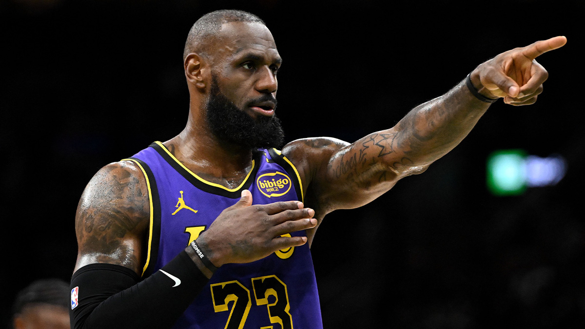 Los Angeles Lakers forward LeBron James (23) calls a play against the Boston Celtics during the second quarter at the TD Garden.