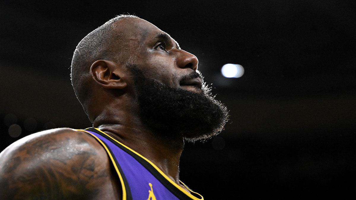 Los Angeles Lakers forward LeBron James (23) looks into the crowd during a timeout in the fourth quarter of a game against the Boston Celtics at the TD Garden.