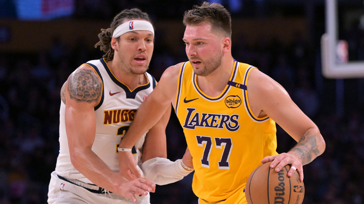 Lakers Guard Luka Dončić holds the ball