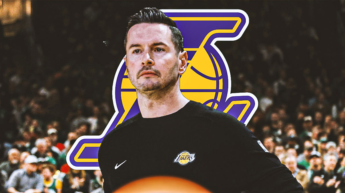 JJ Redick looking upset. Lakers logo in the background.