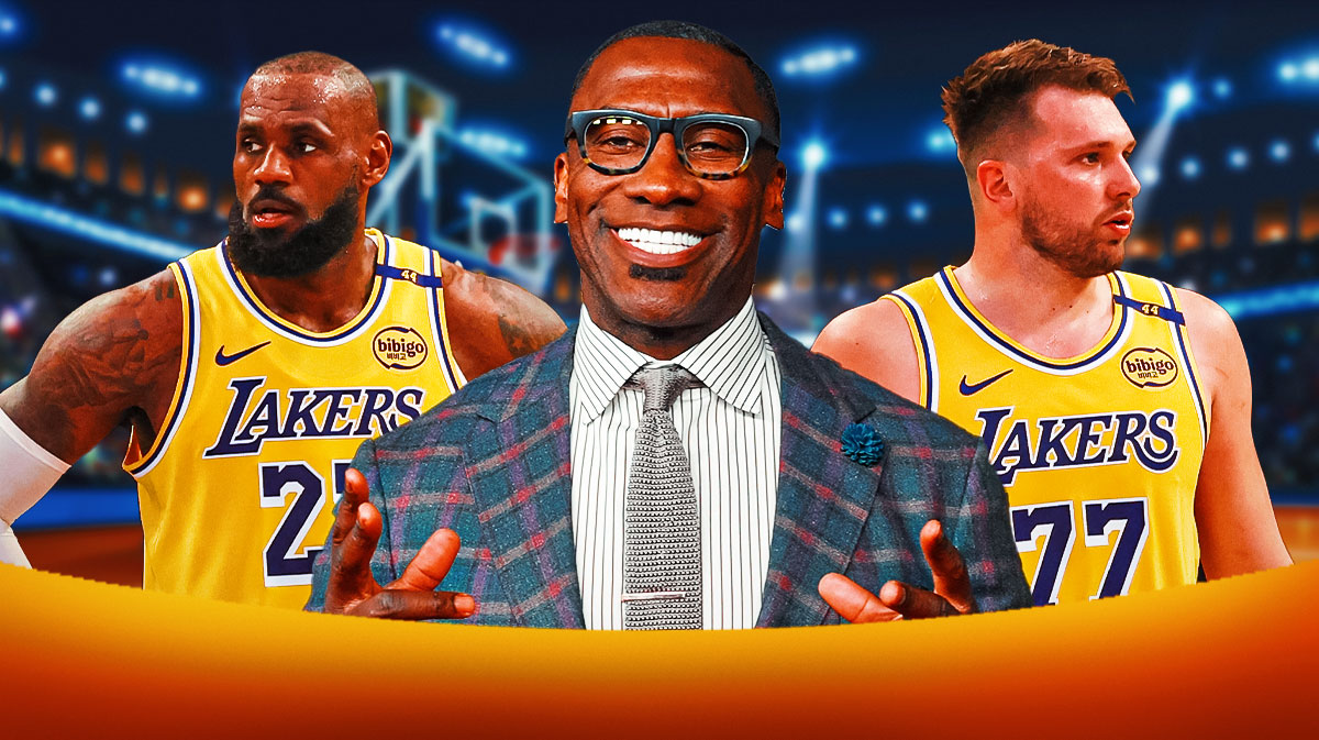 Shannon Sharpe in the middle with Los Angeles Lakers stars LeBron James and Luka Doncic on either side in front of Crypto.com Arena.