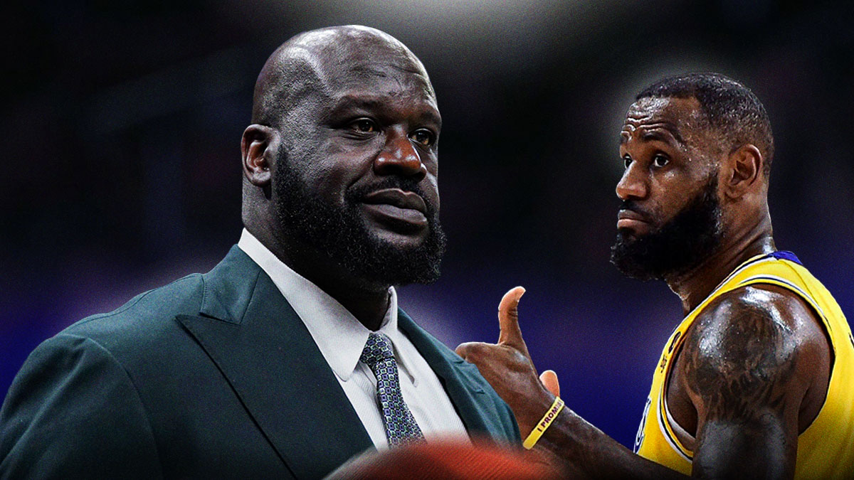 Shaquille O'Neal looking at LeBron James in a Lakers jersey and gives a thumbs up.