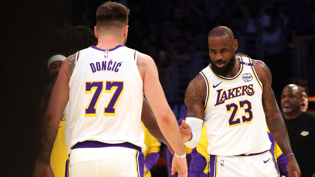 Lakers forward Lebron James (23) and Guard Luka Doncic (77) react after the play during the first quarter against La Clippers on Cripto.com Arena