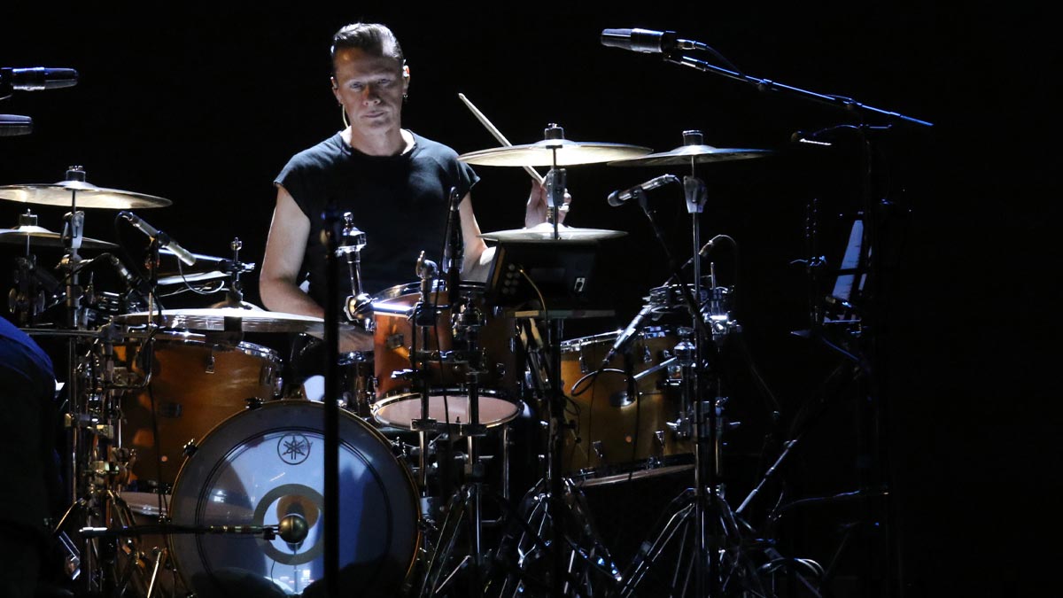 Larry Mullen Jr. performing with U2 in 2017 on the Joshua Tree Tour.