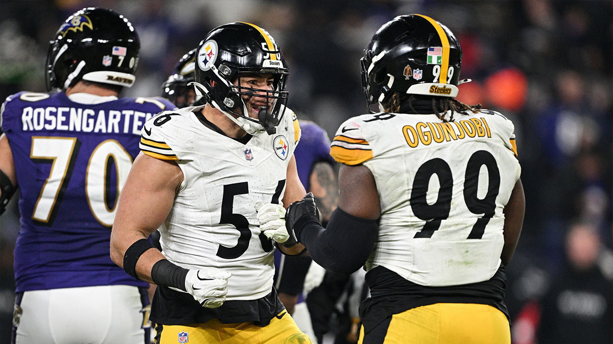 Pittsburgh Steelers linebacker Alex Highsmith (56) and defensive tackle Larry Ogunjobi (99) react in the third quarter against the Baltimore Ravens in an AFC wild card game at M&T Bank Stadium.