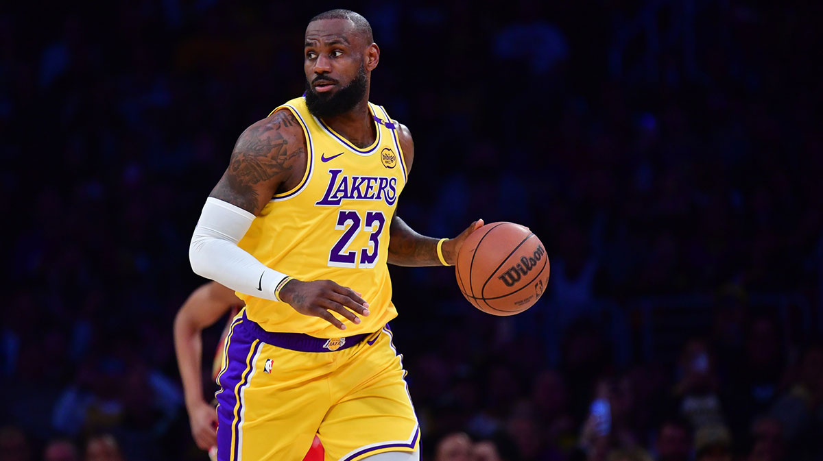 Los Angeles Lakers forward LeBron James (23) controls the ball against the New Orleans Pelicans during the first half at Crypto.com Arena.