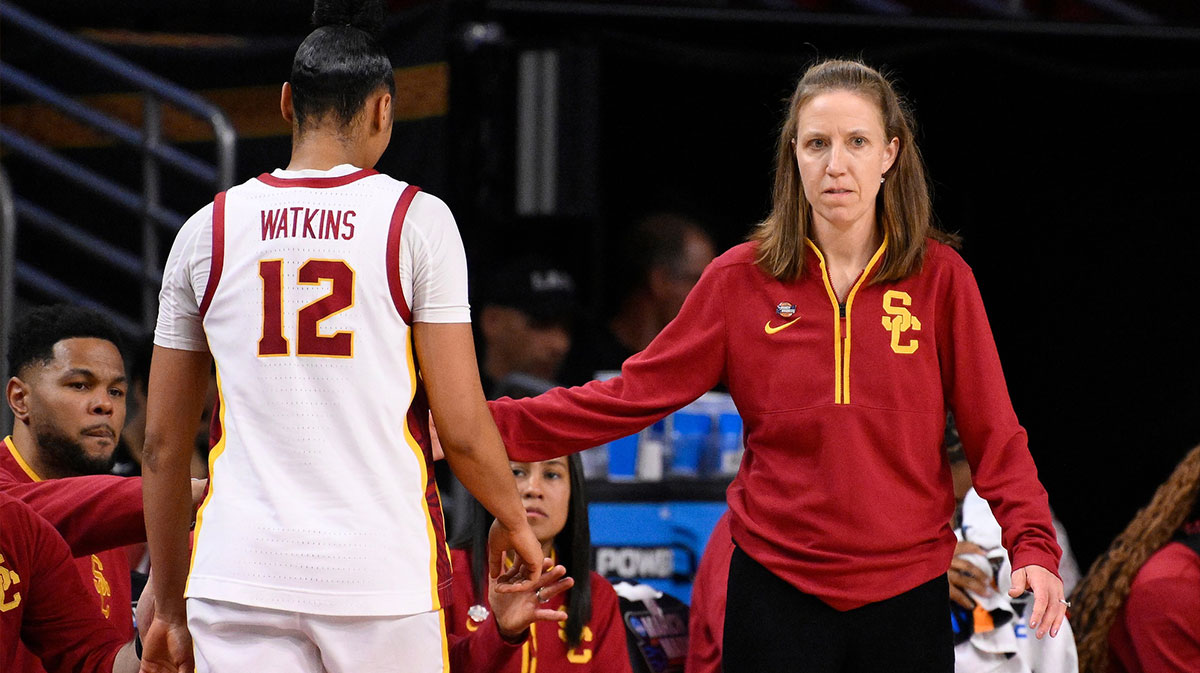 USC Trojans head coach Lindsay Gottlieb greets guard JuJu Watkins (12) as she comes out of the game in the fourth quarter of an NCAA Tournament game against the UNC Greensboro Spartans at Galen Center.