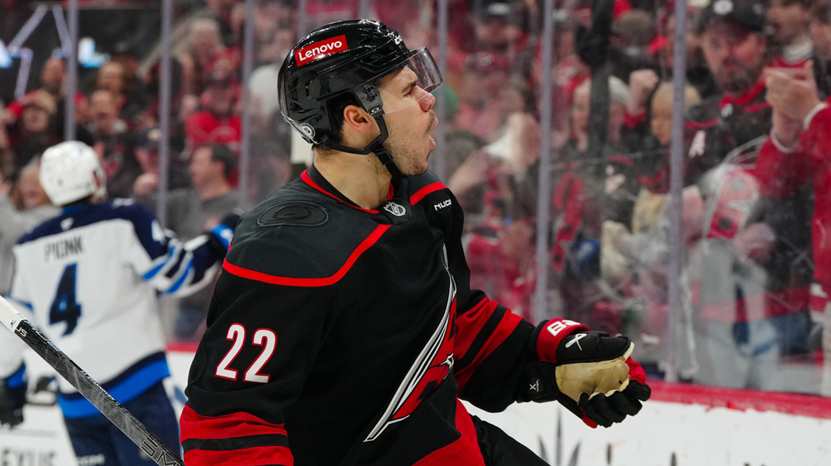 Carolina Hurricanes center Logan Stankoven (22) scores a goal against the Winnipeg Jets during the third period at Lenovo Center.