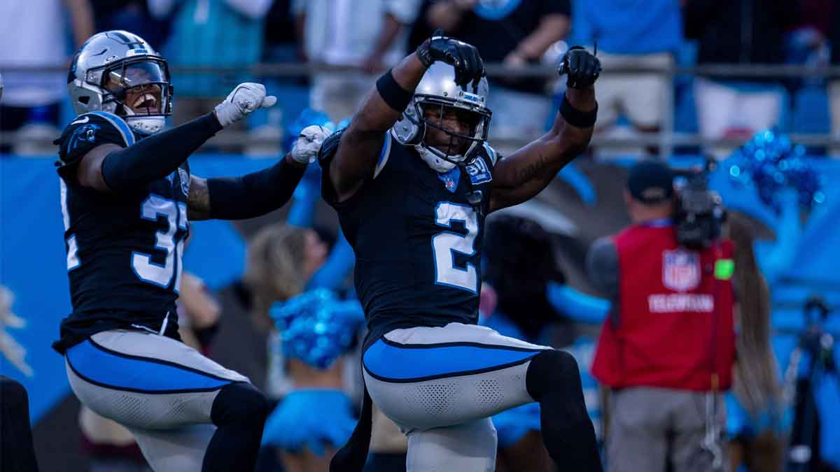 Carolina Panthers cornerback Lonnie Johnson Jr. (32) and cornerback Michael Jackson (2) celebrate after defeating the New Orleans Saints at Bank of America Stadium. Mandatory Credit: Scott Kinser-Imagn Images