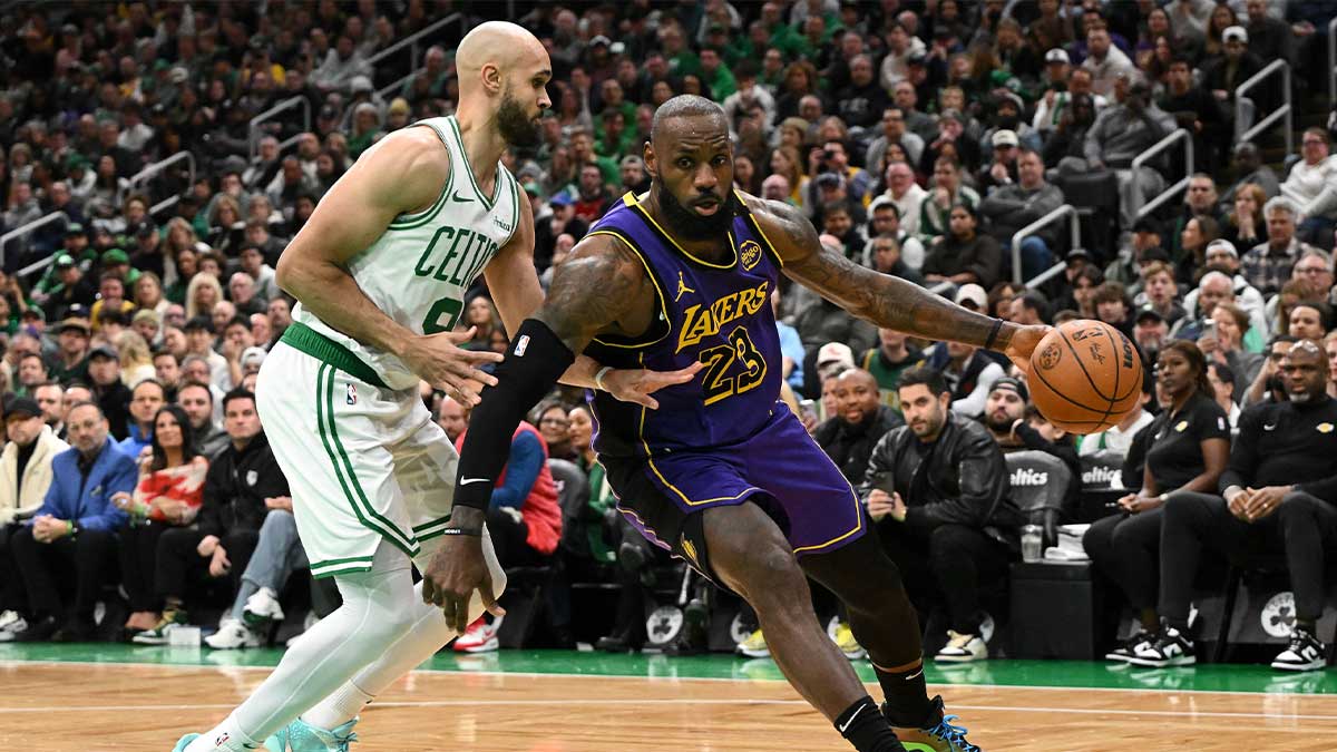 Los Angeles Lakers forward LeBron James (23) drives to the basket against Boston Celtics guard Derrick White (9) during the first quarter at the TD Garden.