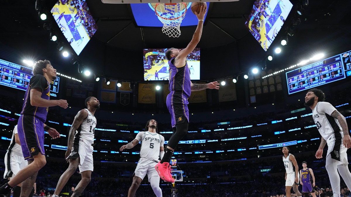 Los Angeles Lakers guard Luka Doncic (77) shoots the ball against the San Antonio Spurs in the second half at Crypto.com Arena. 