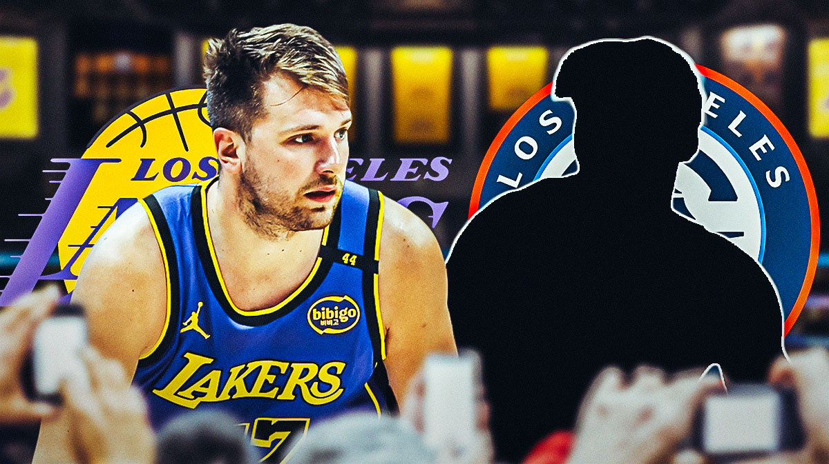 Lakers guard Luka Doncic next to Dorian Finney-Smith (shadowed out) and the Clippers logo with the Lakers logo in the background