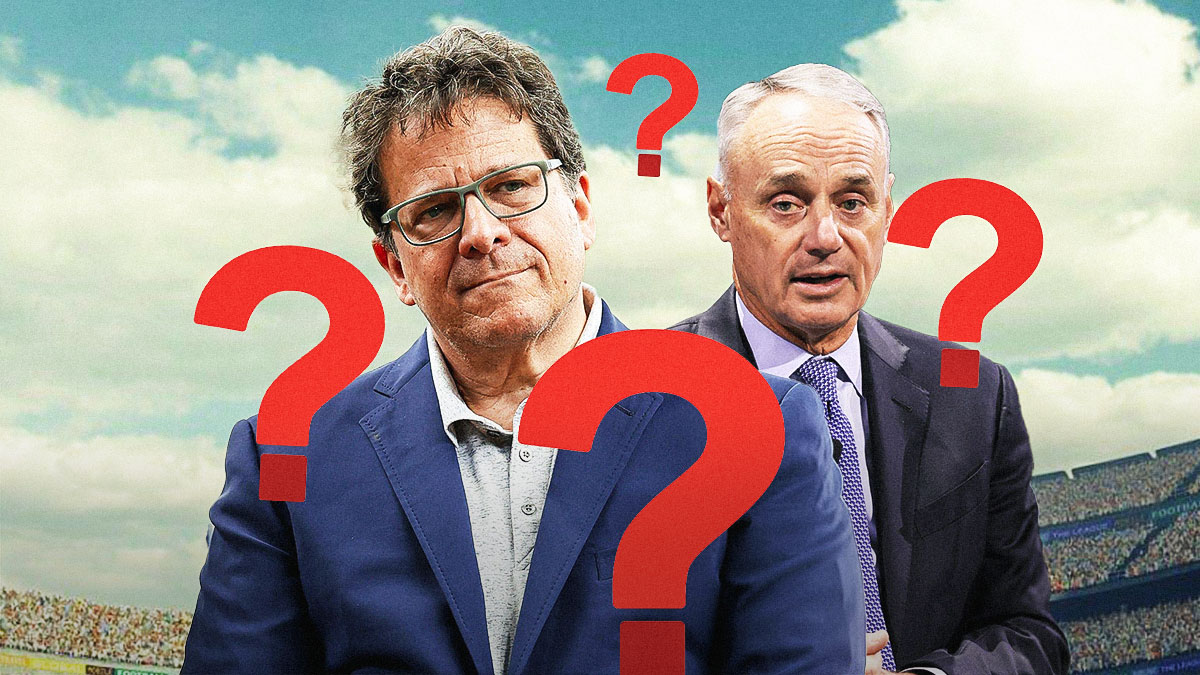 Brewers owner Mark Attanasio standing next to Rob Manfred with question marks everywhere