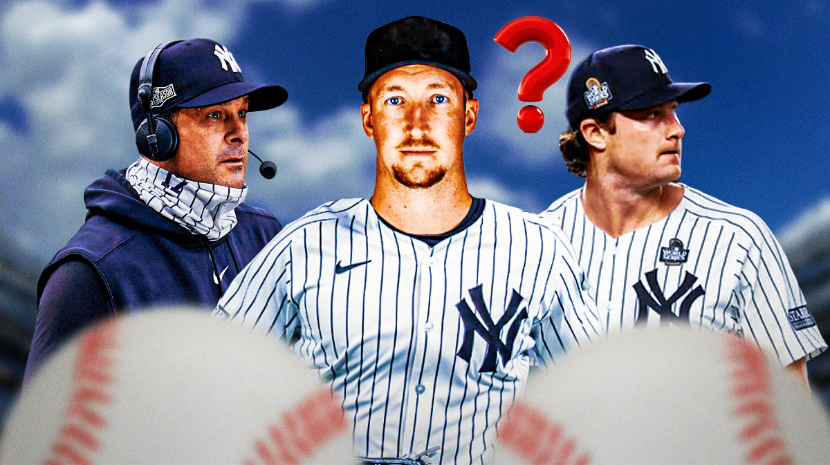 Photo: Erick Fedde in Yankees jersey with question marks above him, Aaron Boone beside him, Gerrit Cole in background looking serious, Yankee Stadium as silhouette