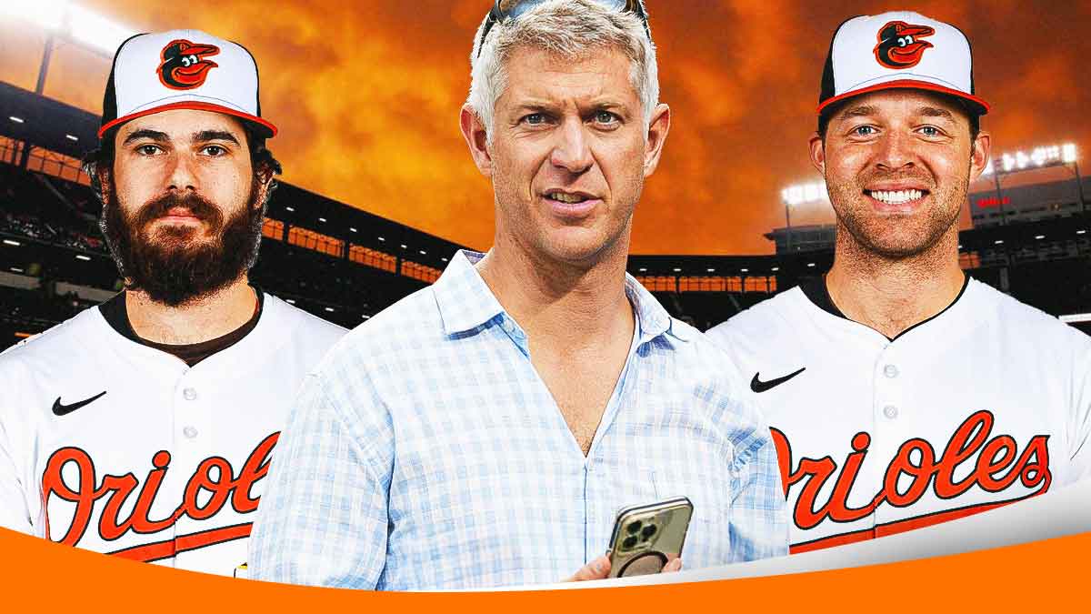 Baltimore Orioles general manager Mike Elias talking and/or on phone in center, San Diego Padres starting pitcher Dylan Cease with jersey swap into Baltimore Orioles on left side, San Diego Padres starting pitcher Michael King with jersey swap to Baltimore Orioles on right side, Oriole Park at Camden Yards (home stadium of the Baltimore Orioles) in background