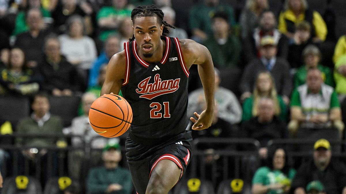 Indiana Hoosiers forward Mackenzie Mgbako (21) dribbles the ball against the Oregon Ducks during the second half at Matthew Knight Arena.