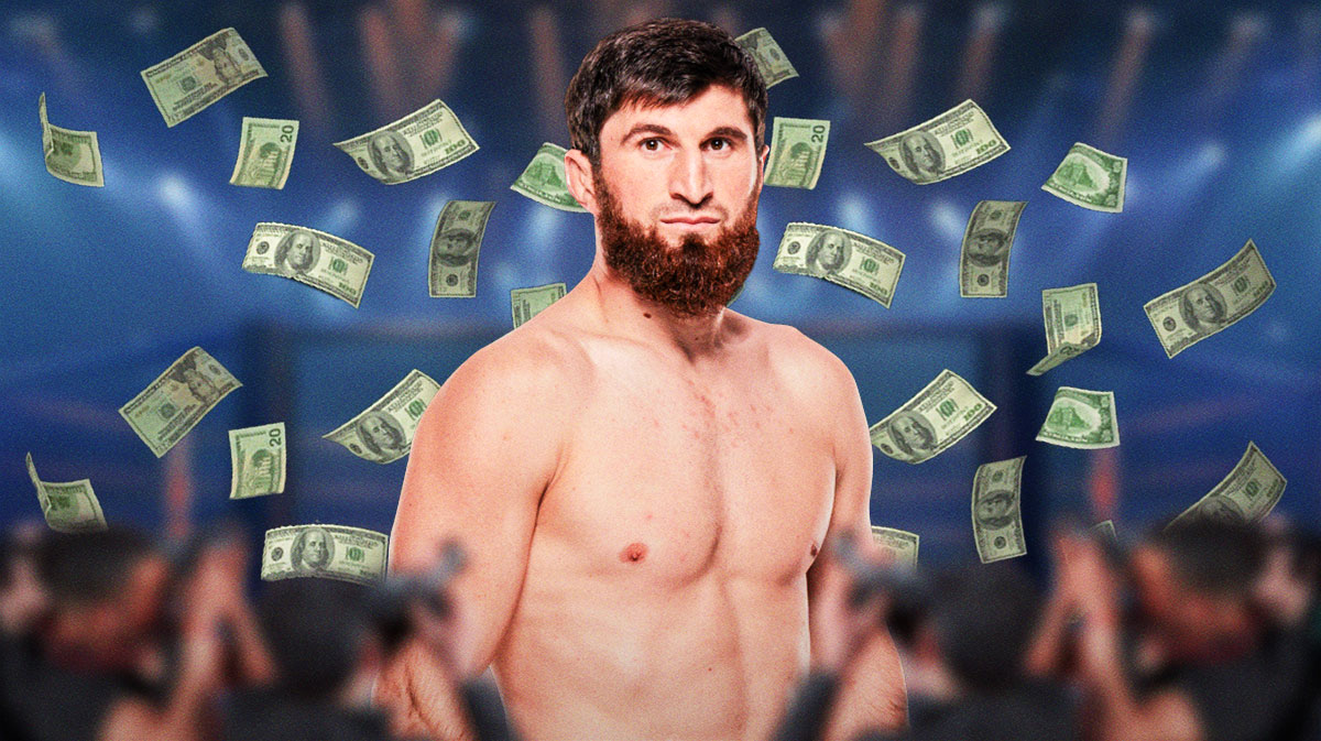Magomed Ankalaev with money all around him